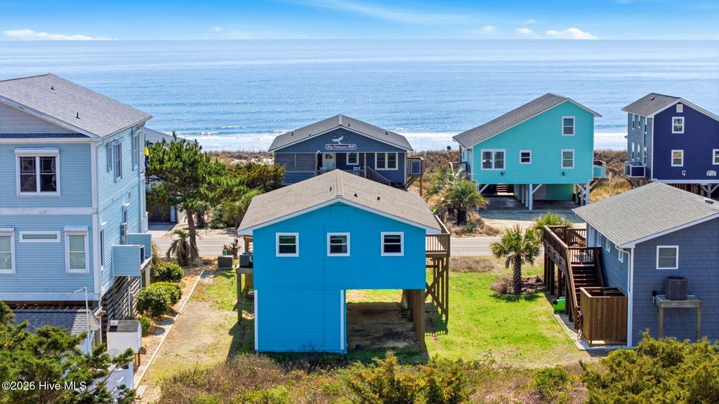 Photo of 2504 W Beach Drive, Oak Island, NC 28465 (MLS # 100557870)