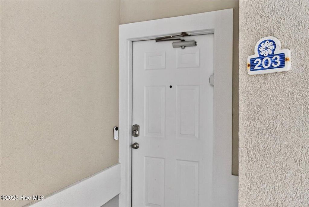 Photo of 908 Resort Circle #Unit 203, Sunset Beach, NC 28468 (MLS # 100542994)