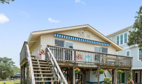 Photo of 3526 E Dolphin Drive, Oak Island, NC 28465 (MLS # 100548347)