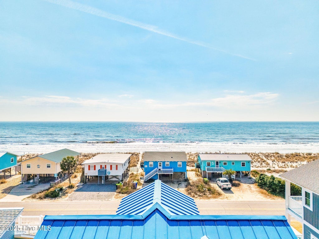 Photo of 318 E Beach Drive, Oak Island, NC 28465 (MLS # 100602742)
