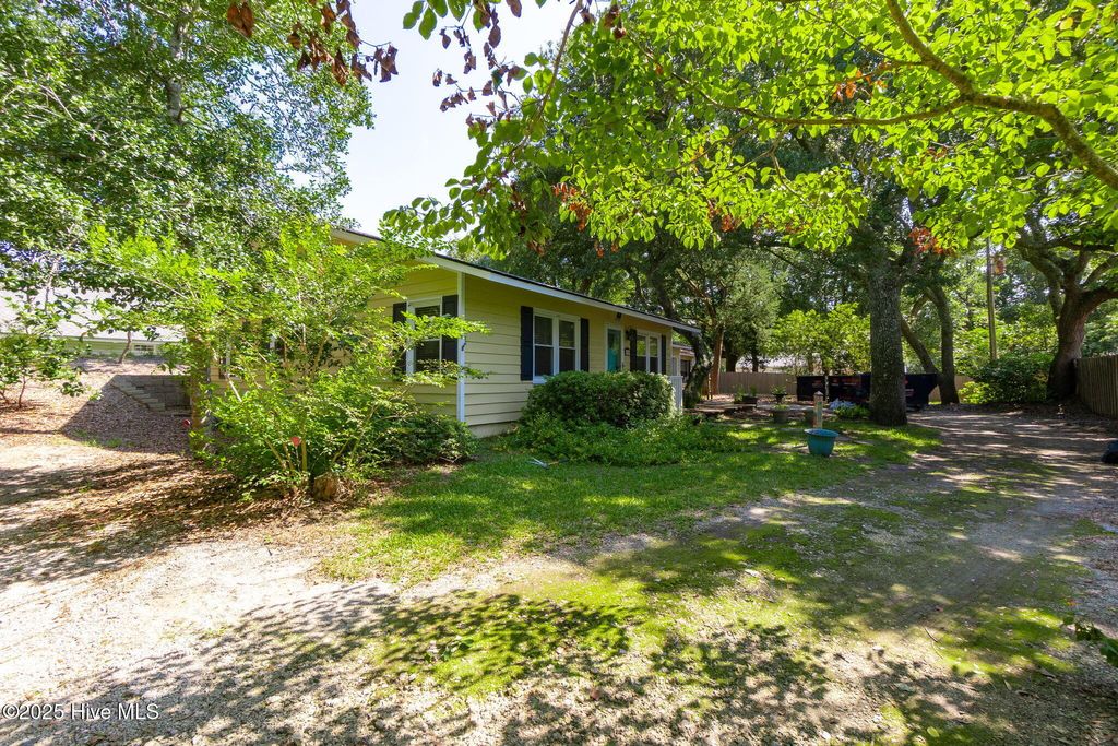 Photo of 110 Holly Road, Pine Knoll Shores, NC 28512 (MLS # 100525431)