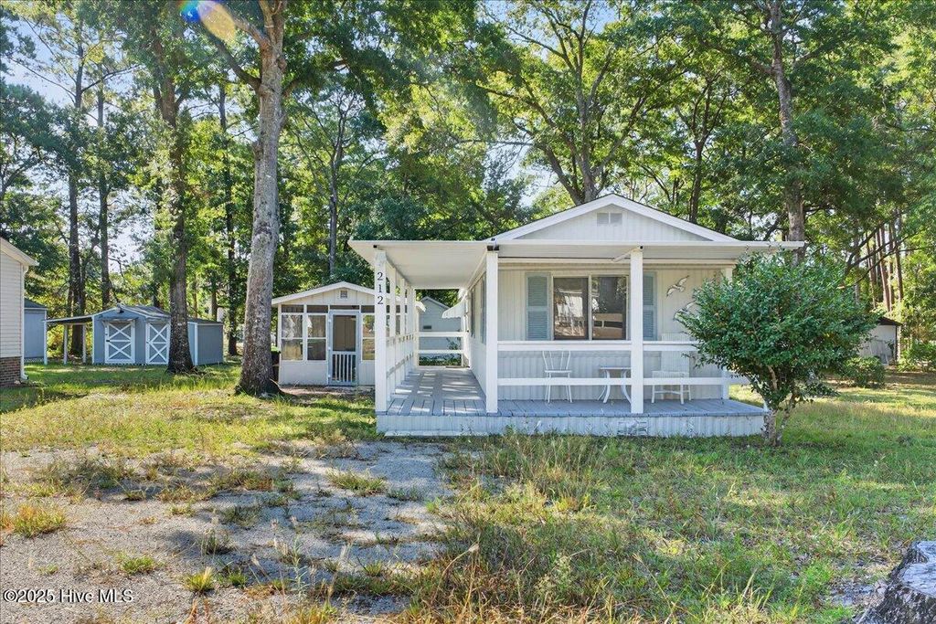 Photo of 212 Dogwood Drive, Sunset Beach, NC 28468 (MLS # 100531410)