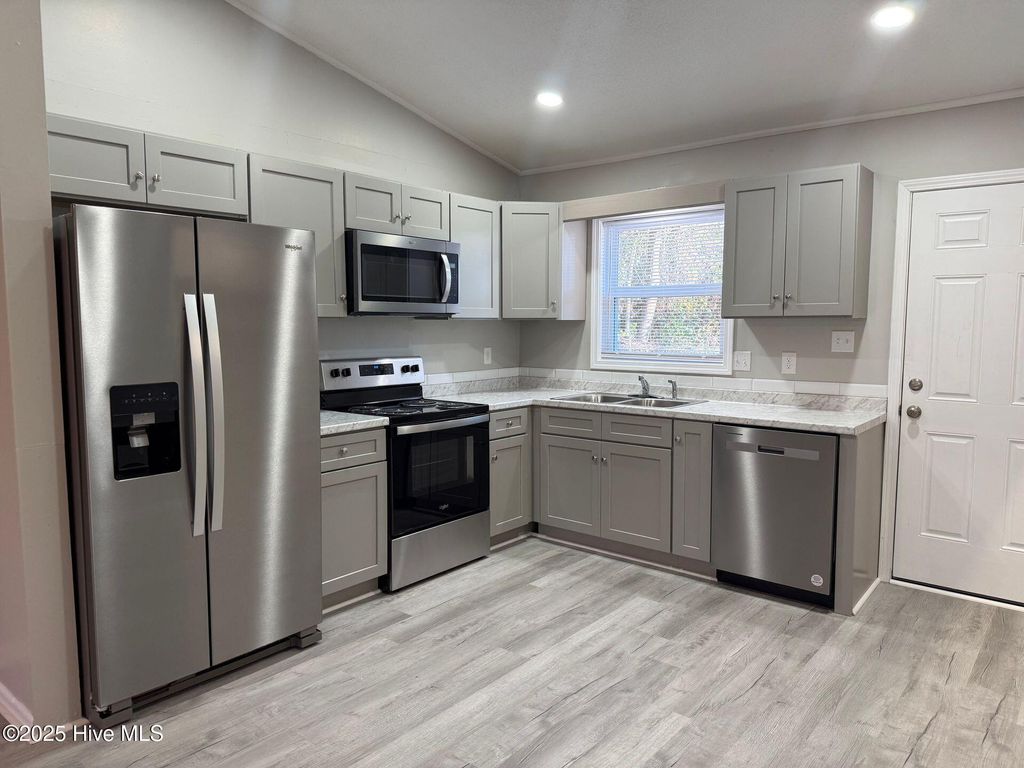 Photo of 305 Cedar Creek Drive, Jacksonville, NC 28540 (MLS # 100545836)