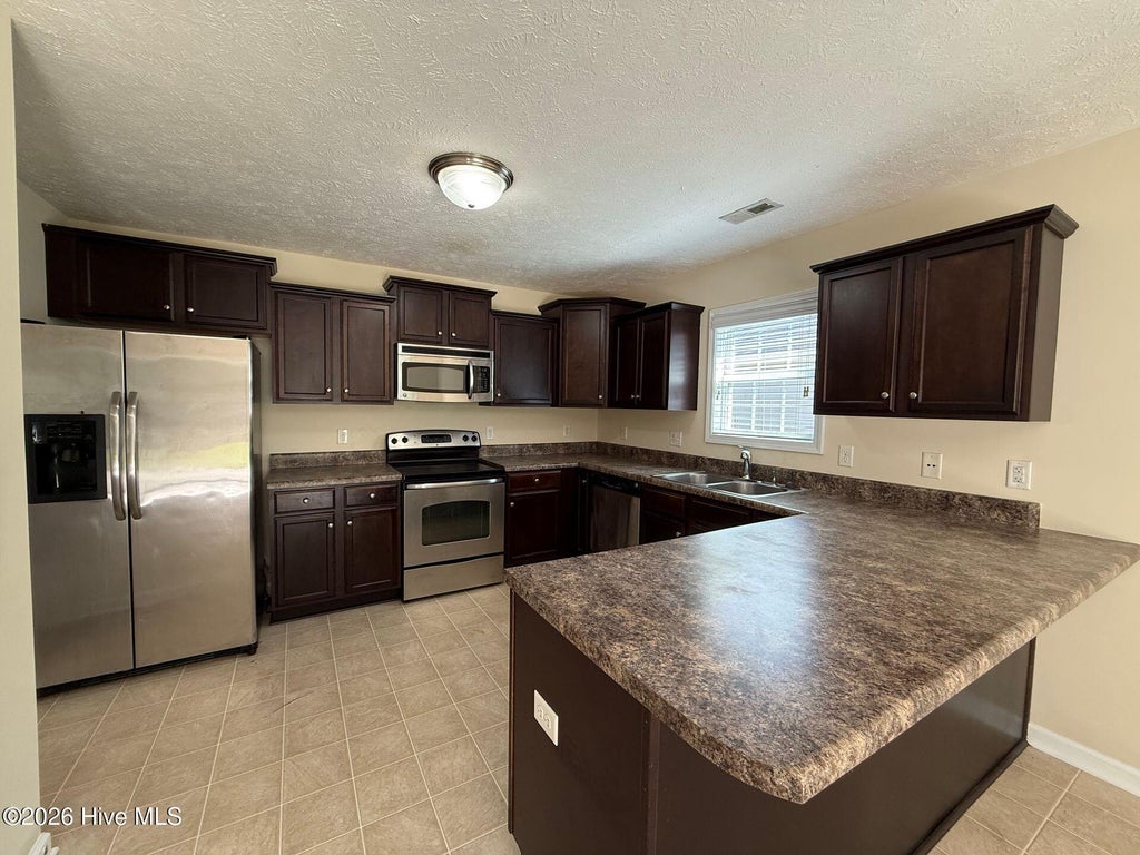 Photo of 319 Hughes Lane, Jacksonville, NC 28546 (MLS # 100608942)