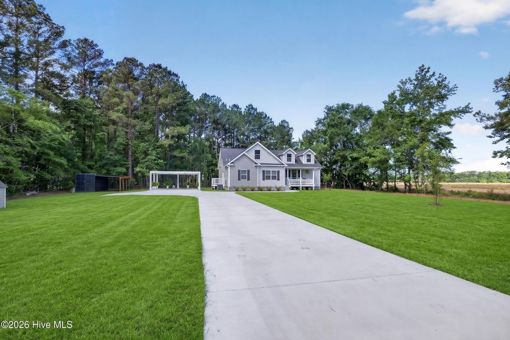 Photo of 451 Governors Road SE, Winnabow, NC 28479 (MLS # 100576151)