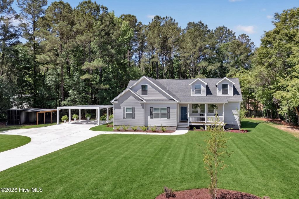 Photo of 451 Governors Road SE, Winnabow, NC 28479 (MLS # 100576151)