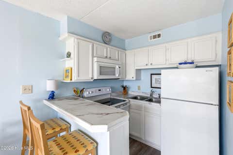 Tiny photo for 222 N Carolina Beach Avenue N #Unit 128, Carolina Beach, NC 28428 (MLS # 100598670)
