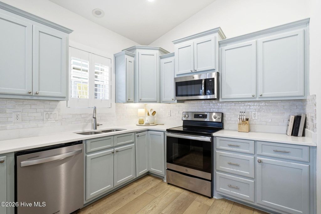 Photo of 113 NE 54th Street, Oak Island, NC 28465 (MLS # 100561485)