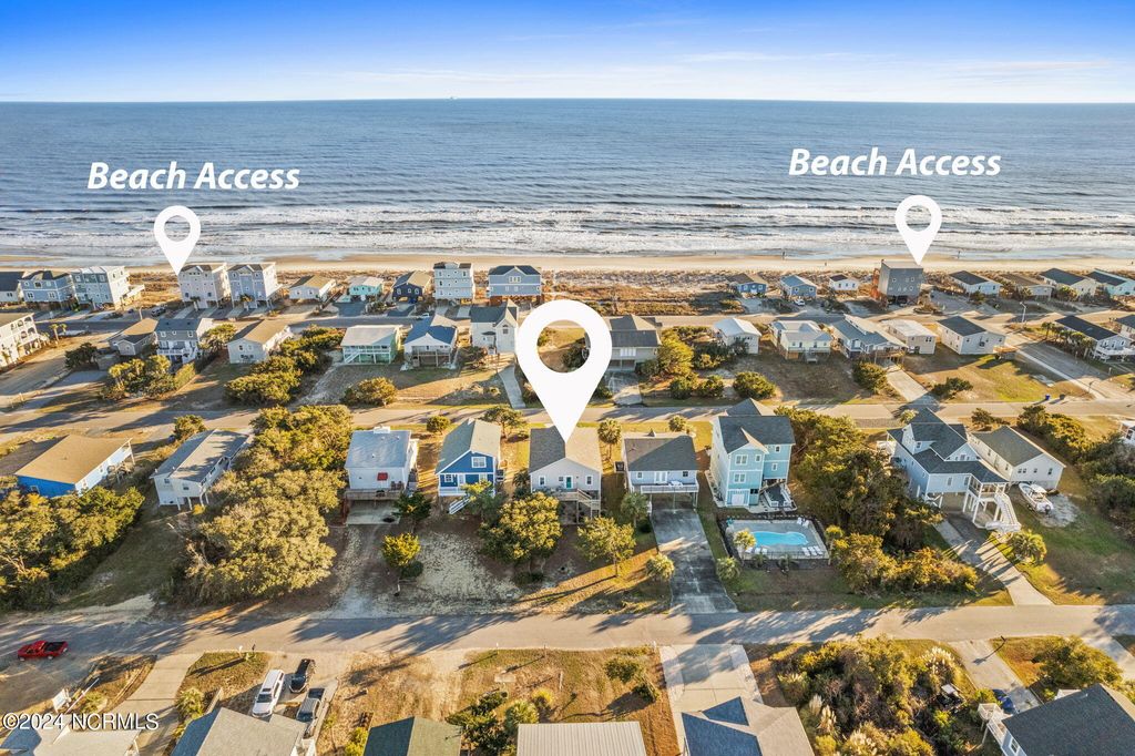 Photo of 916 E Dolphin Drive, Oak Island, NC 28465 (MLS # 100566939)