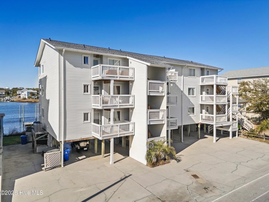 Photo of 709 Canal Drive #Apt 1a, Carolina Beach, NC 28428 (MLS # 100550502)