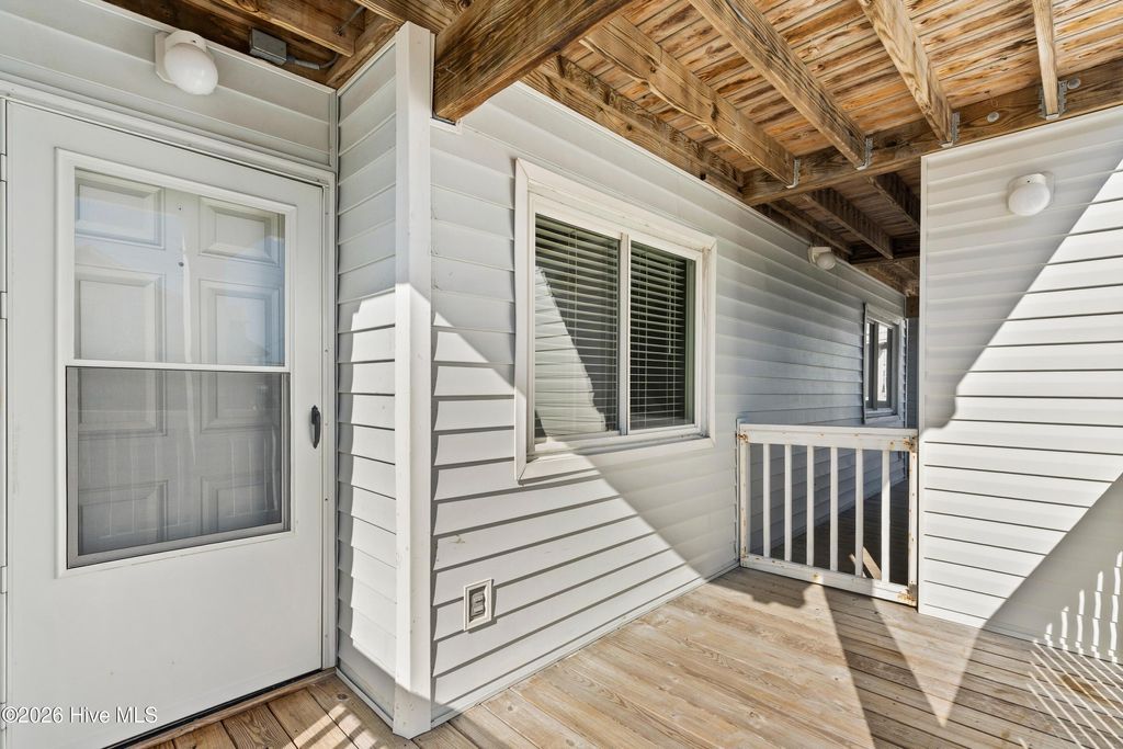 Photo of 709 Canal Drive #Apt 1a, Carolina Beach, NC 28428 (MLS # 100550502)