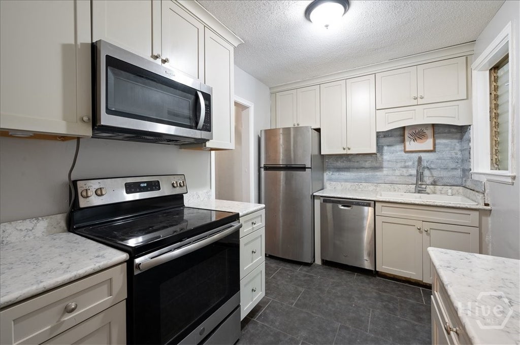 Photo of 1702 E 41st Street, Savannah, GA 31404 (MLS # SA364851)