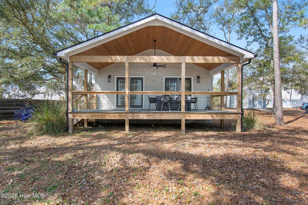 Photo of 107 NE 65th Street, Oak Island, NC 28465 (MLS # 100561306)