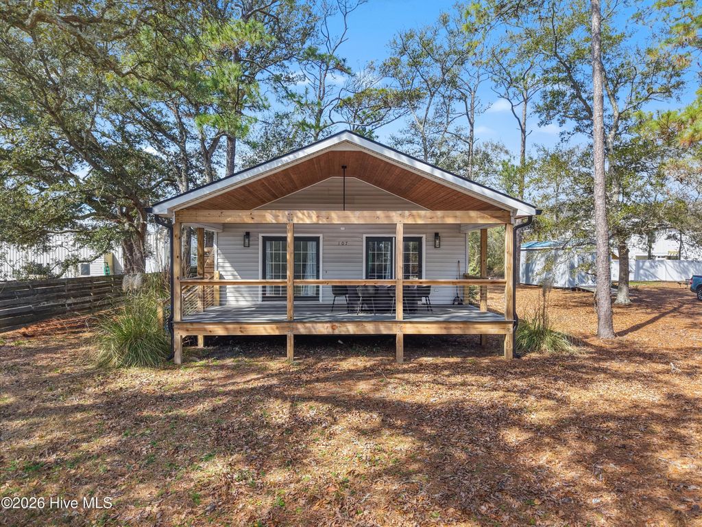 Photo of 107 NE 65th Street, Oak Island, NC 28465 (MLS # 100561306)