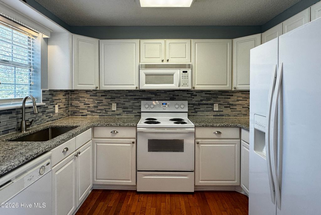 Photo of 1509 Country Club Drive, Hampstead, NC 28443 (MLS # 100558739)