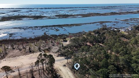 Photo of 55 Dockside Drive, Hampstead, NC 28443 (MLS # 100561391)