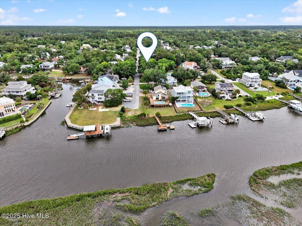 Photo of 106 SW 24th Street, Oak Island, NC 28465 (MLS # 100510824)