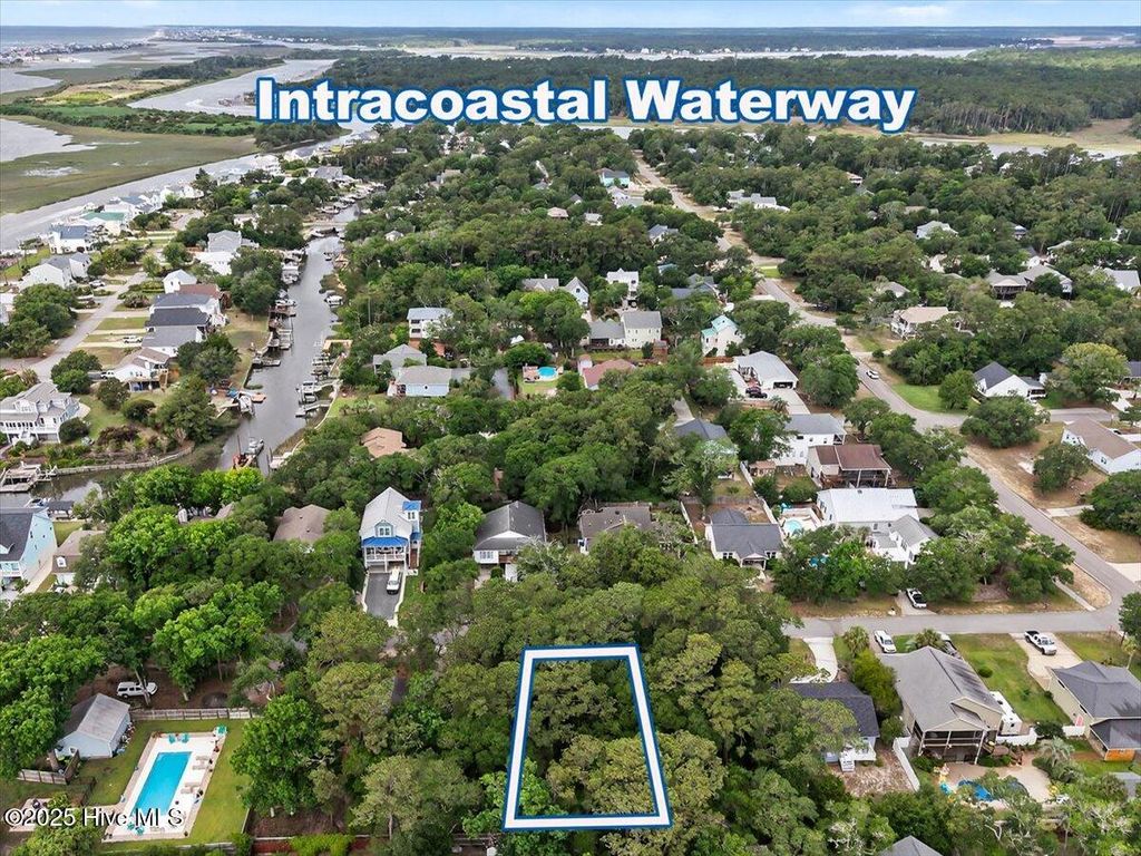 Photo of 106 SW 24th Street, Oak Island, NC 28465 (MLS # 100510824)