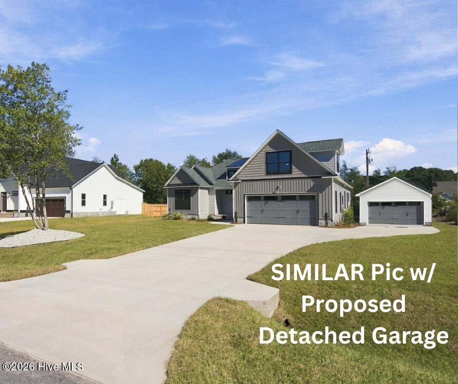 Photo of 107 Weathersbee Drive, Hampstead, NC 28443 (MLS # 100607216)