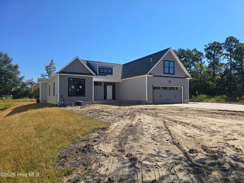 Photo of 107 Weathersbee Drive, Hampstead, NC 28443 (MLS # 100607216)