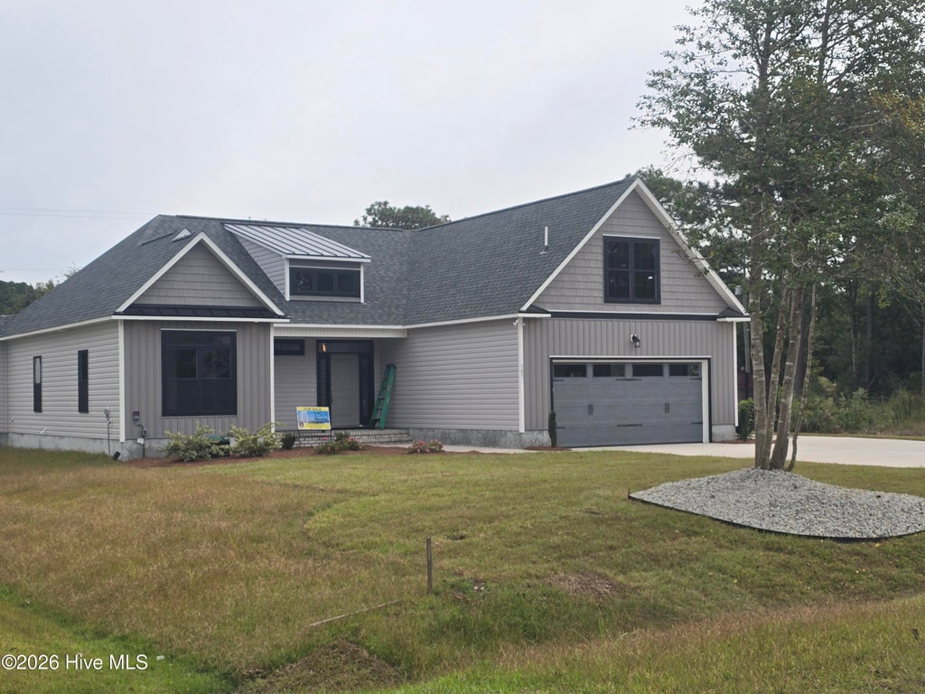 Photo of 107 Weathersbee Drive, Hampstead, NC 28443 (MLS # 100607216)