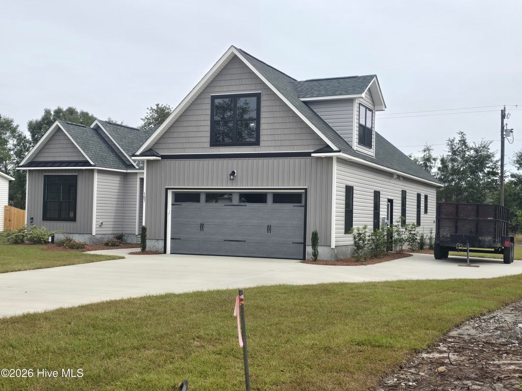 Photo of 107 Weathersbee Drive, Hampstead, NC 28443 (MLS # 100607216)