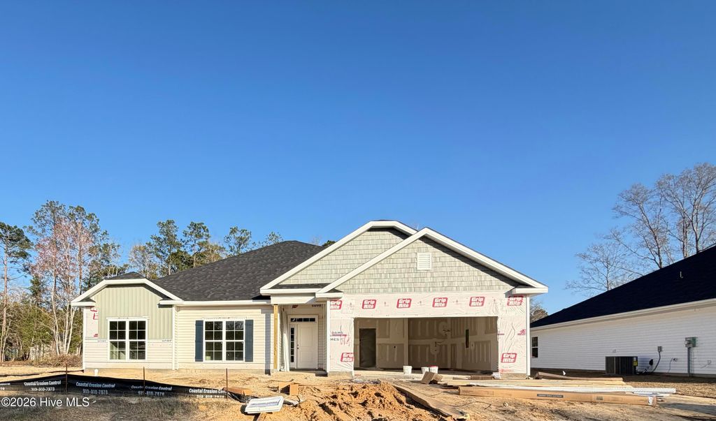 Photo of 1017 Wood Creek Road NE, Leland, NC 28451 (MLS # 100552380)