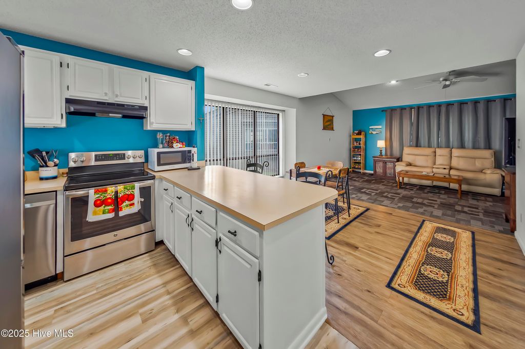 Photo of 7801 Windward Drive, New Bern, NC 28560 (MLS # 100522546)