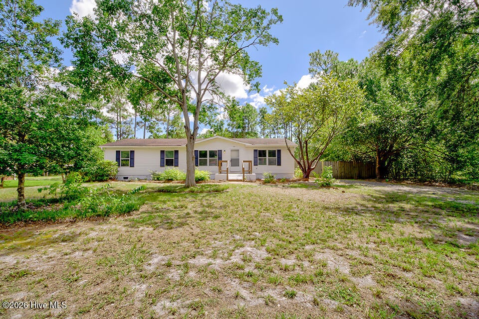 Photo of 7321 Hunters Ridge NE, Leland, NC 28451 (MLS # 100602198)