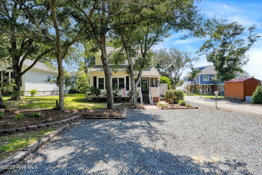 Photo of 122 SE 2nd Street, Oak Island, NC 28465 (MLS # 100527837)