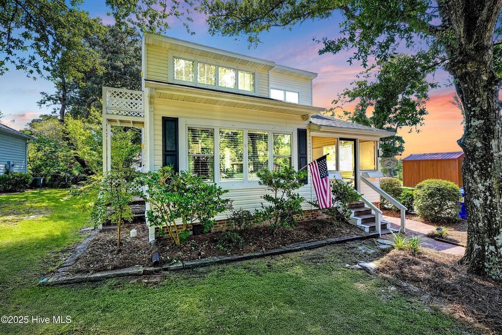 Photo of 122 SE 2nd Street, Oak Island, NC 28465 (MLS # 100527837)