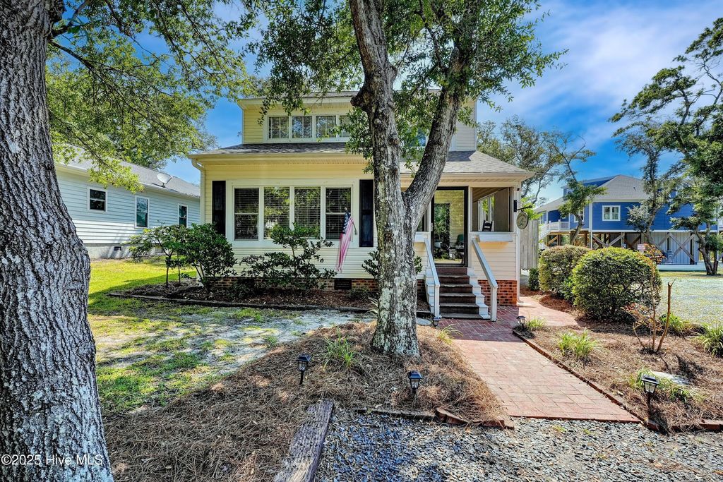 Photo of 122 SE 2nd Street, Oak Island, NC 28465 (MLS # 100527837)