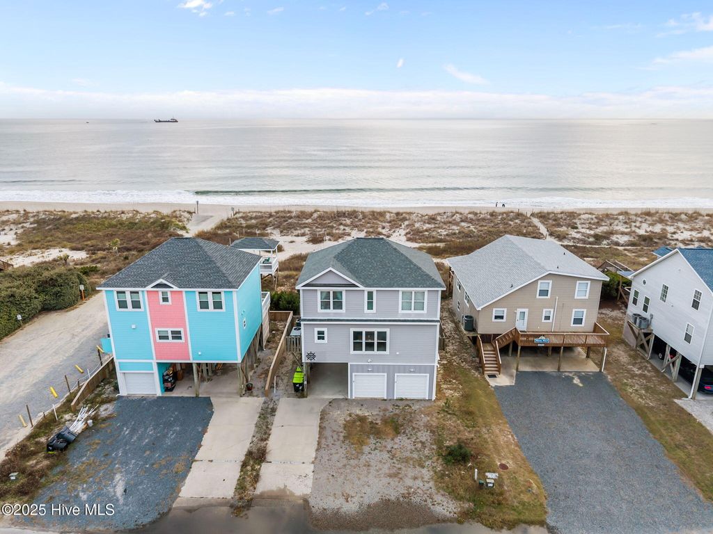 Photo of 2227 E Beach Drive, Oak Island, NC 28465 (MLS # 100544258)