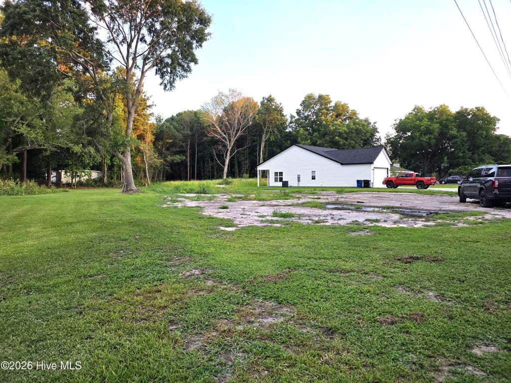 Photo of 1390 Old Folkstone Road, Sneads Ferry, NC 28460 (MLS # 100592825)