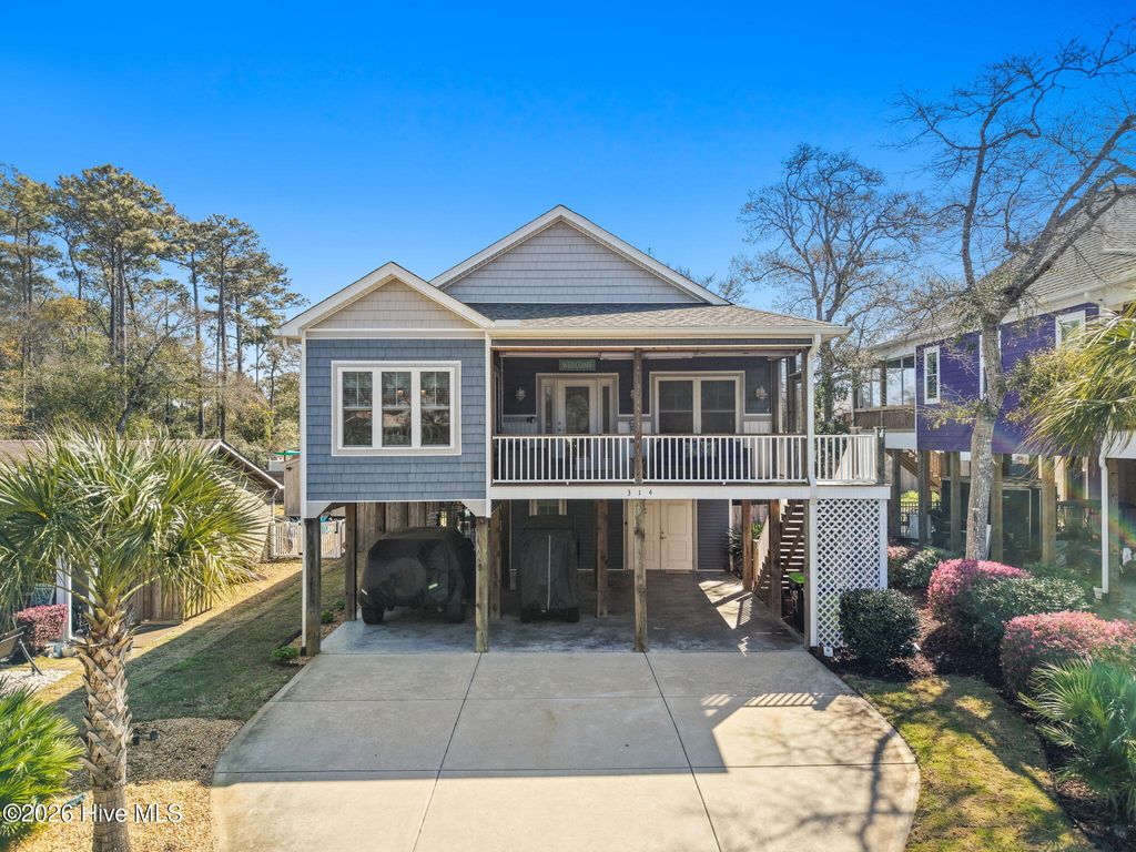 Photo of 314 NE 61st Street, Oak Island, NC 28465 (MLS # 100563118)