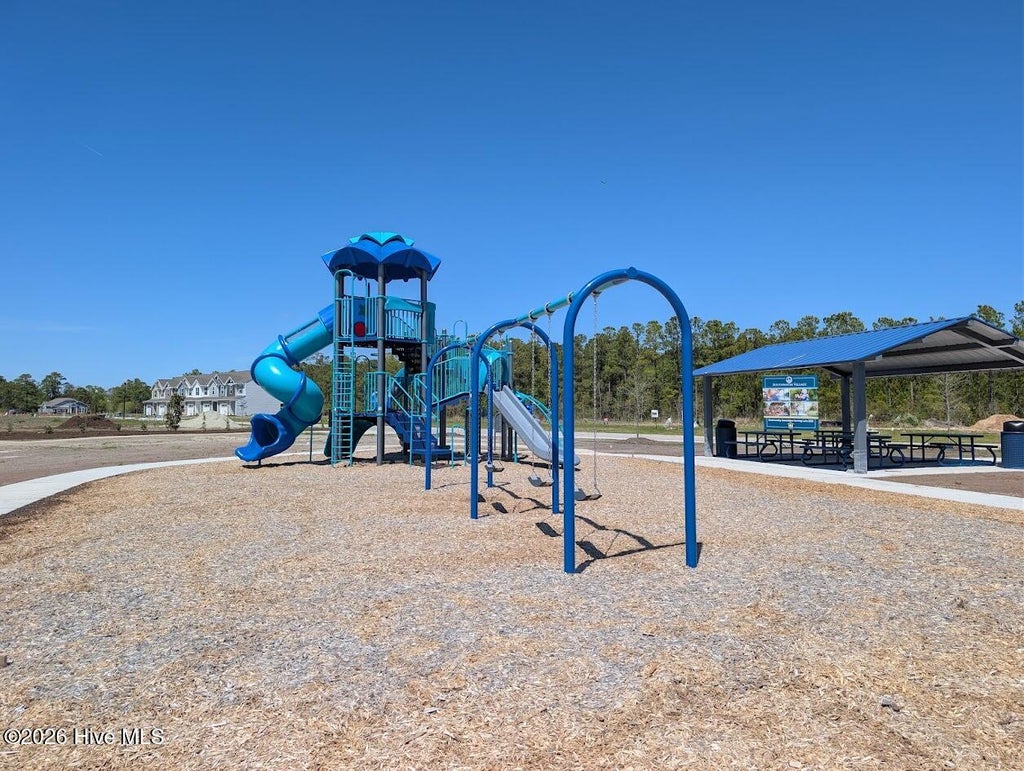 Photo of 200 S Umbrella Palm Drive, Hampstead, NC 28443 (MLS # 100607099)