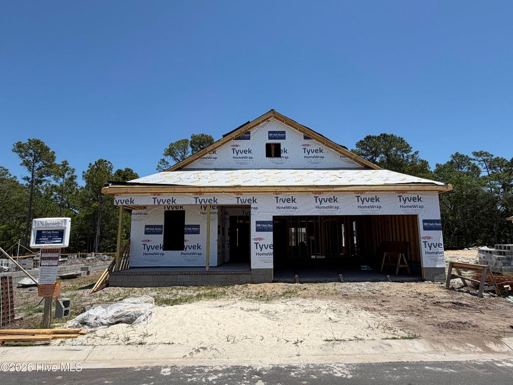Photo of 2415 Lake Ridge Drive, Southport, NC 28461 (MLS # 100575803)