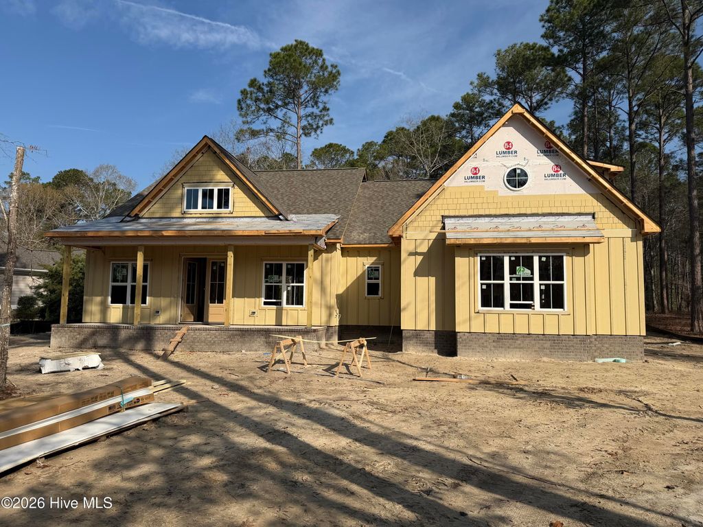 Photo of 894 Hollybriar Drive SE, Bolivia, NC 28422 (MLS # 100543431)