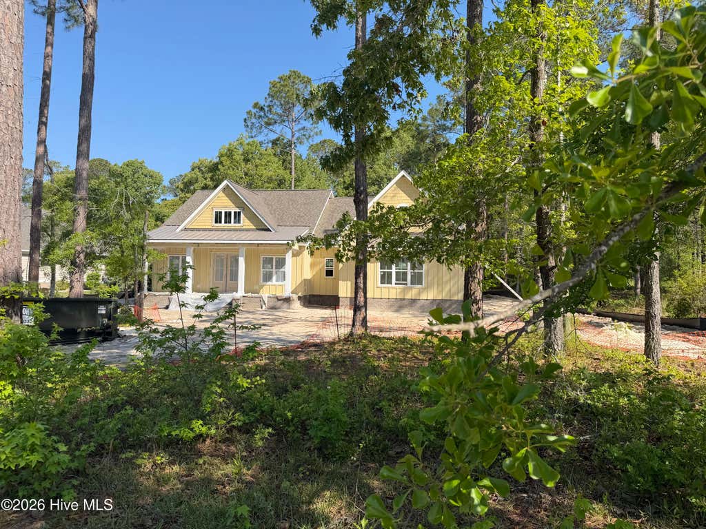 Photo of 894 Hollybriar Drive SE, Bolivia, NC 28422 (MLS # 100543431)