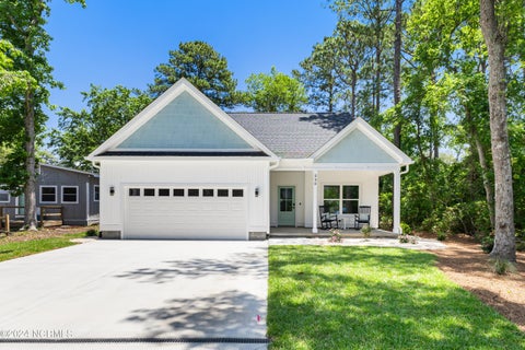 Photo of 230 NE 74th Street, Oak Island, NC 28465 (MLS # 100592816)