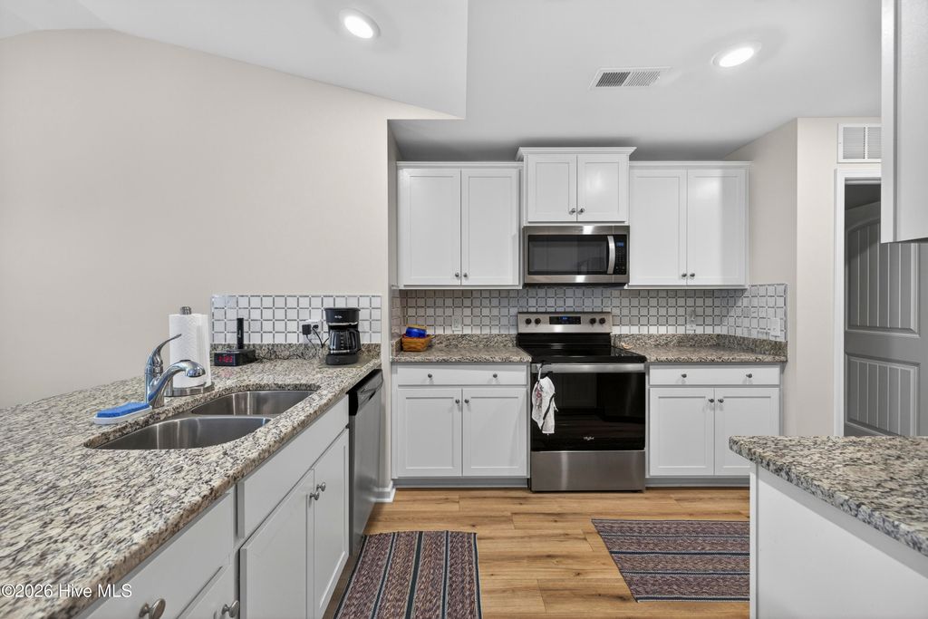 Photo of 429 Poppleton Drive, Hampstead, NC 28443 (MLS # 100570076)