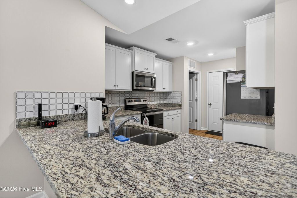 Photo of 429 Poppleton Drive, Hampstead, NC 28443 (MLS # 100570076)