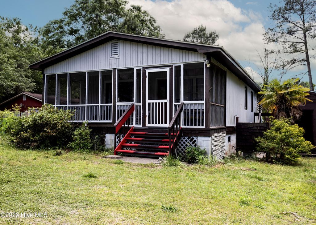 Photo of 408 Old Folkstone Road, Holly Ridge, NC 28445 (MLS # 100574077)