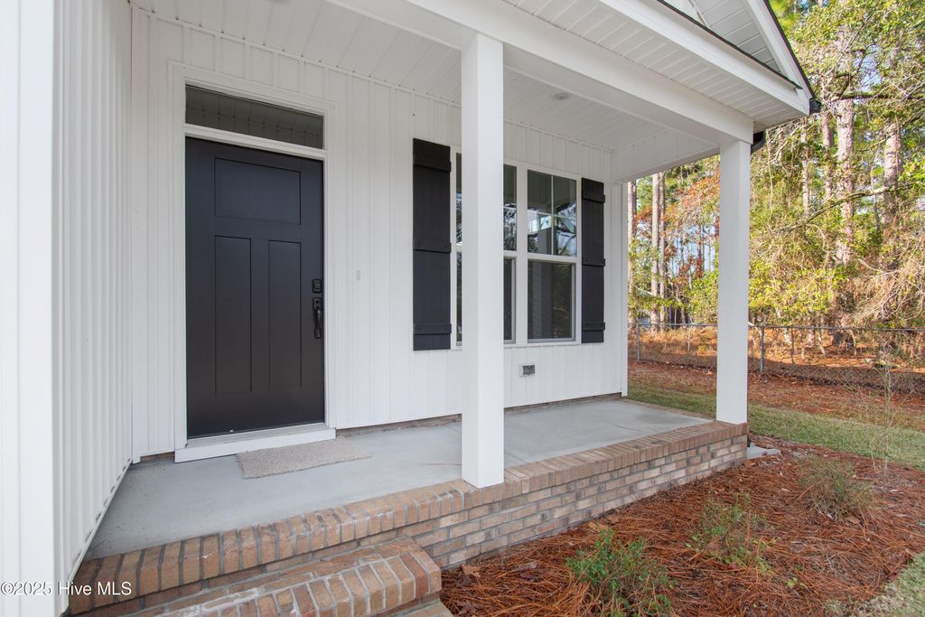 Photo of 253 Sycamore Road, Southport, NC 28461 (MLS # 100505840)