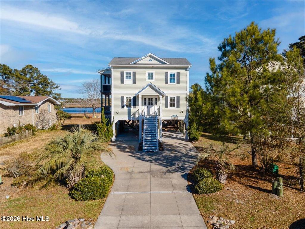 Photo of 5106 E Yacht Drive, Oak Island, NC 28465 (MLS # 100547142)