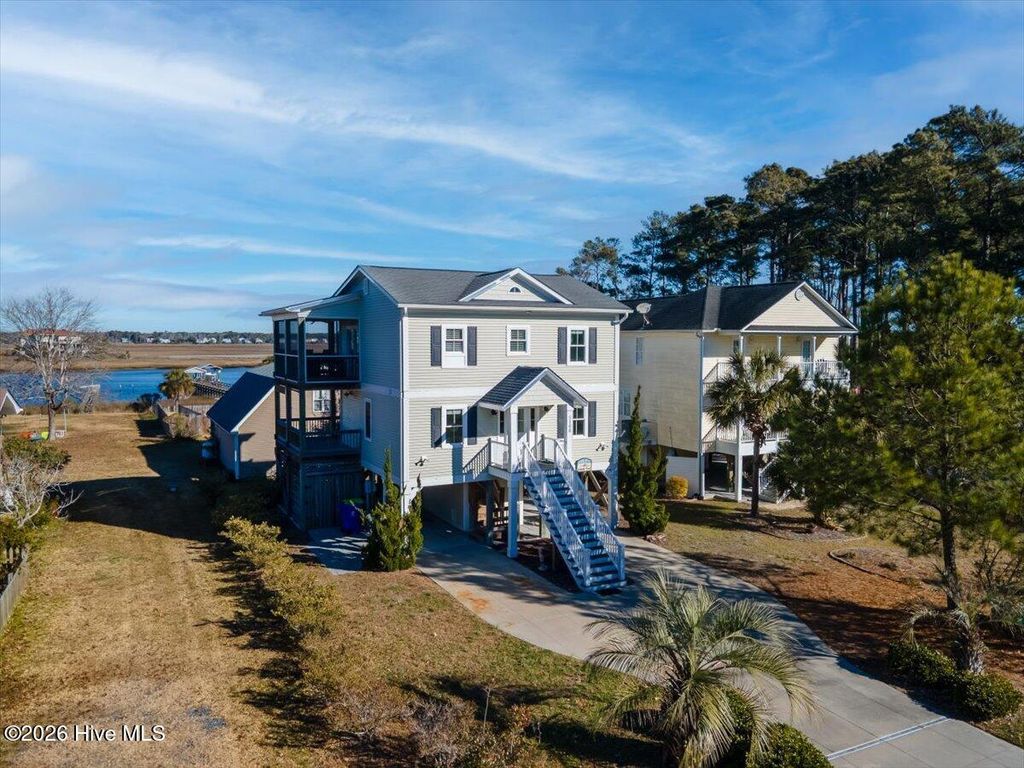 Photo of 5106 E Yacht Drive, Oak Island, NC 28465 (MLS # 100547142)