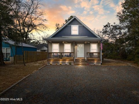 Photo of 125 NW 15th Street, Oak Island, NC 28465 (MLS # 100546923)