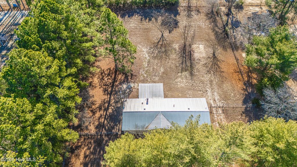 Photo of 660 Pinebluff Lake Road, Aberdeen, NC 28315 (MLS # 100545856)