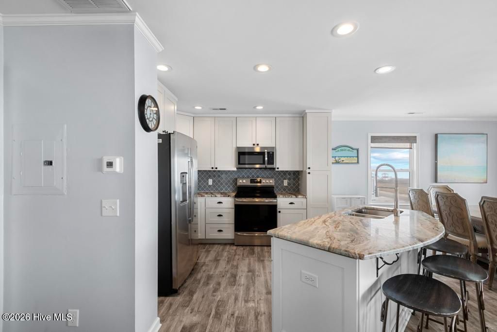 Photo of 1255 New River Inlet Road, North Topsail Beach, NC 28460 (MLS # 100559201)