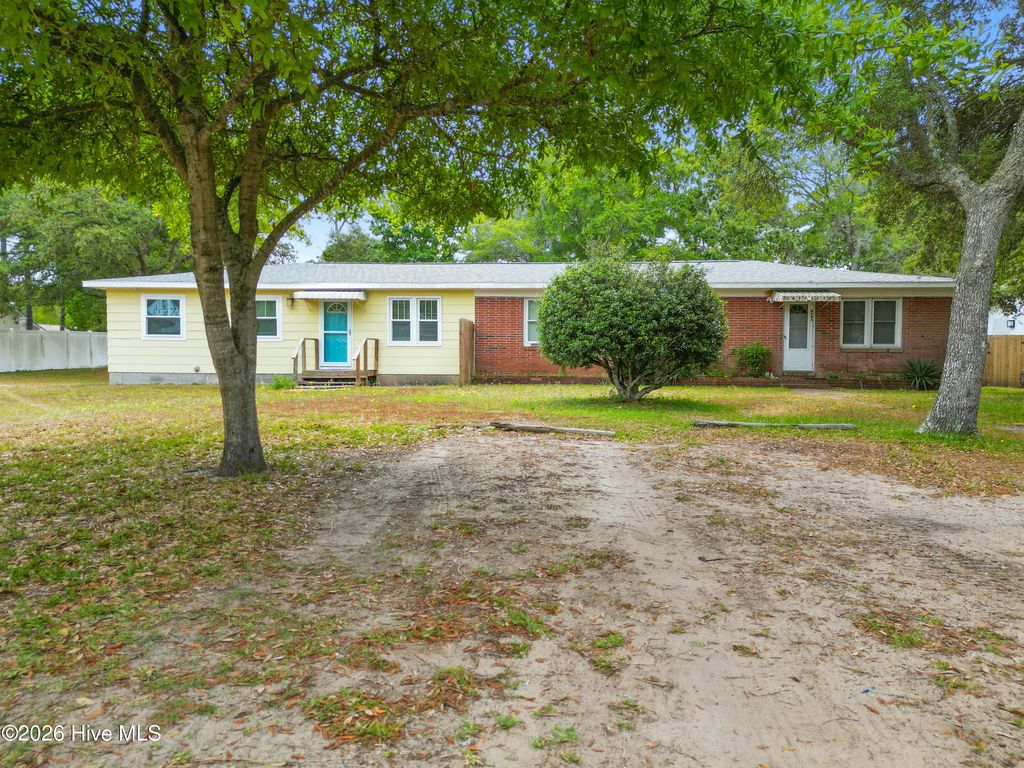 Photo of 404 Norton Street, Oak Island, NC 28465 (MLS # 100570997)
